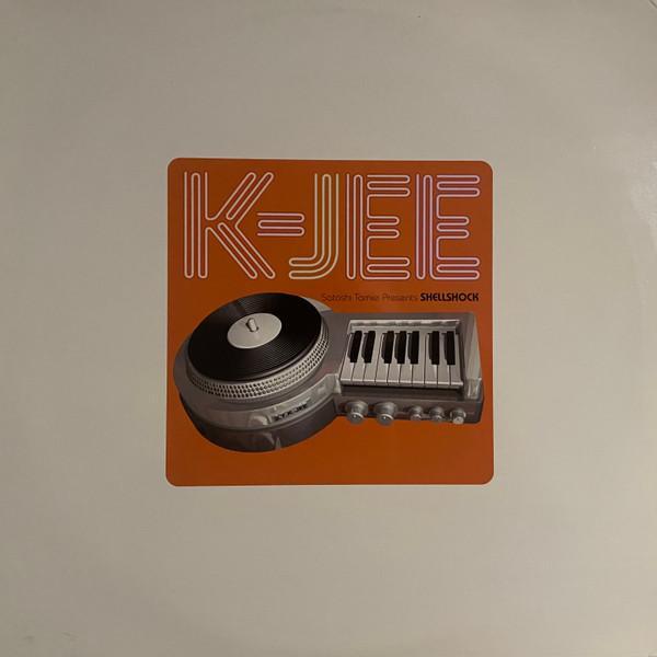 Satoshi Tomiie, Shellshock - K-Jee